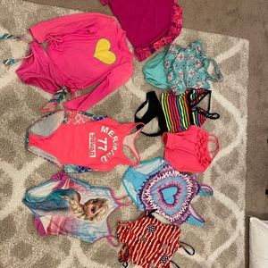 Kids bathing suit and swim shirt lot .